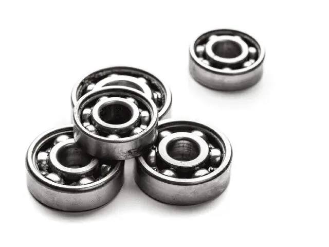 A group of four bearings sitting on top of each other.